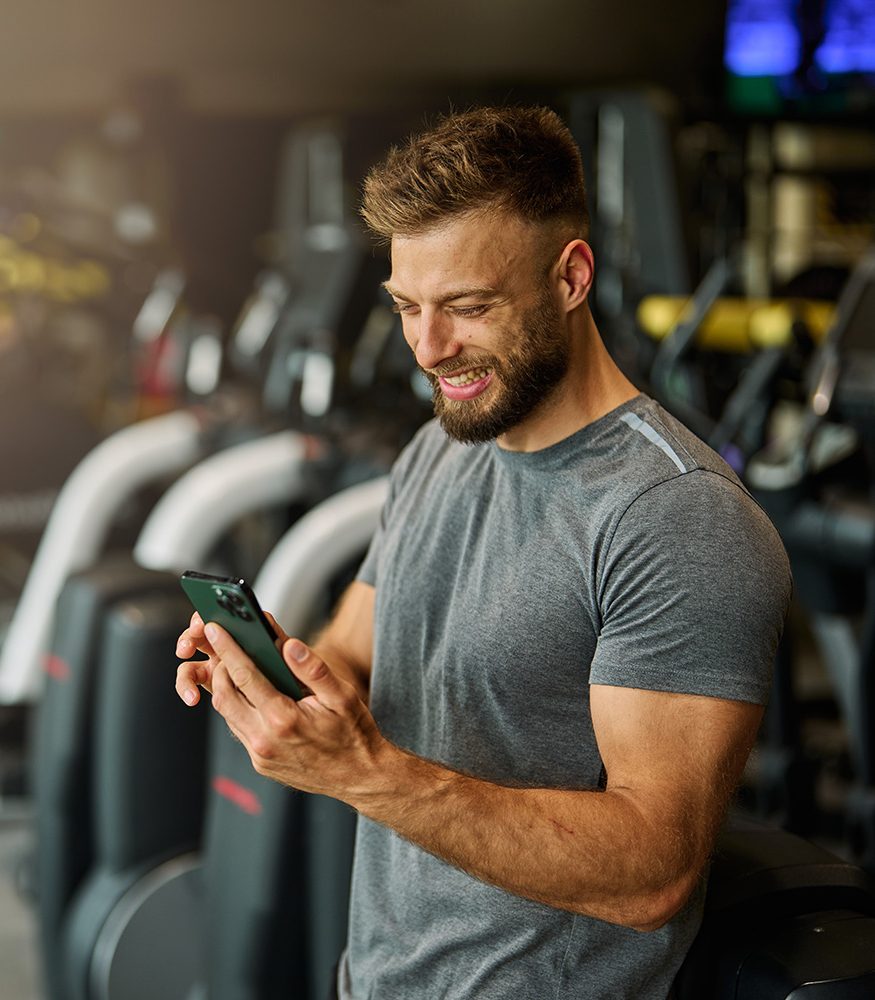 Member using secure app-based access at Wallace Fitness Center